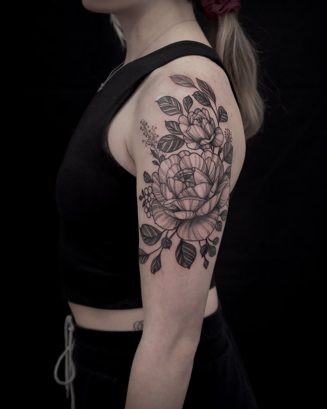 Fine line floral tattoos