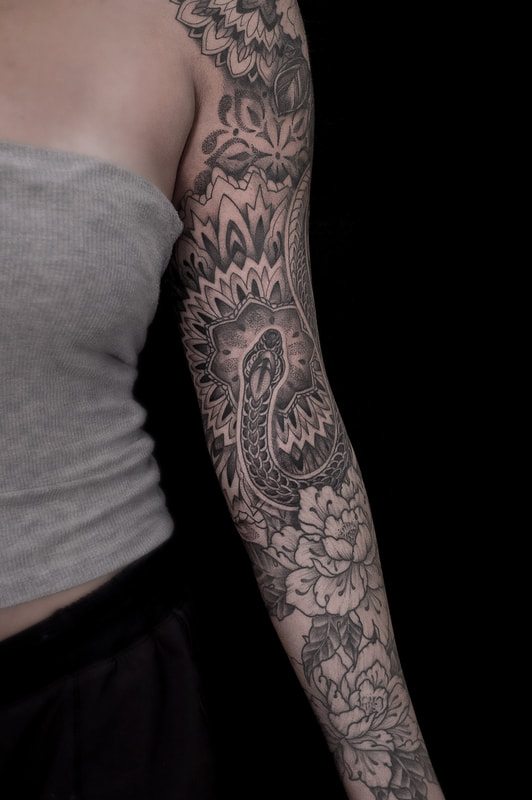 Close Up Snake and Mandala Floral Sleeve Tattoo by Adam LoRusso artist black and grey 