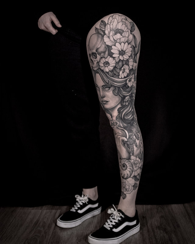 A woman with full leg sleeve tattoo of mythology Persephone by Boston artist Adam LoRusso
