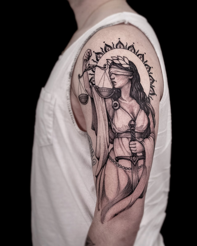 Tattoo by Adam LoRusso artist black and grey boston lady justice tattoo