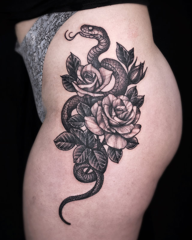 Tattoo by Adam LoRusso artist black and grey boston snake roses tattoo