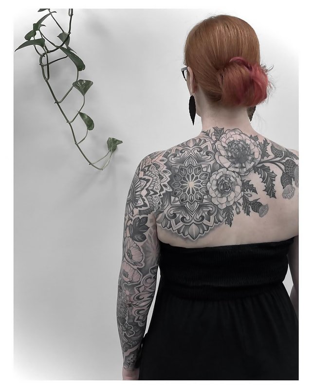 Back and Sleeve Geometric work Tattoo by tattoo artist Adam LoRusso Last Light Tattoo Studio Medford Massachusetts
