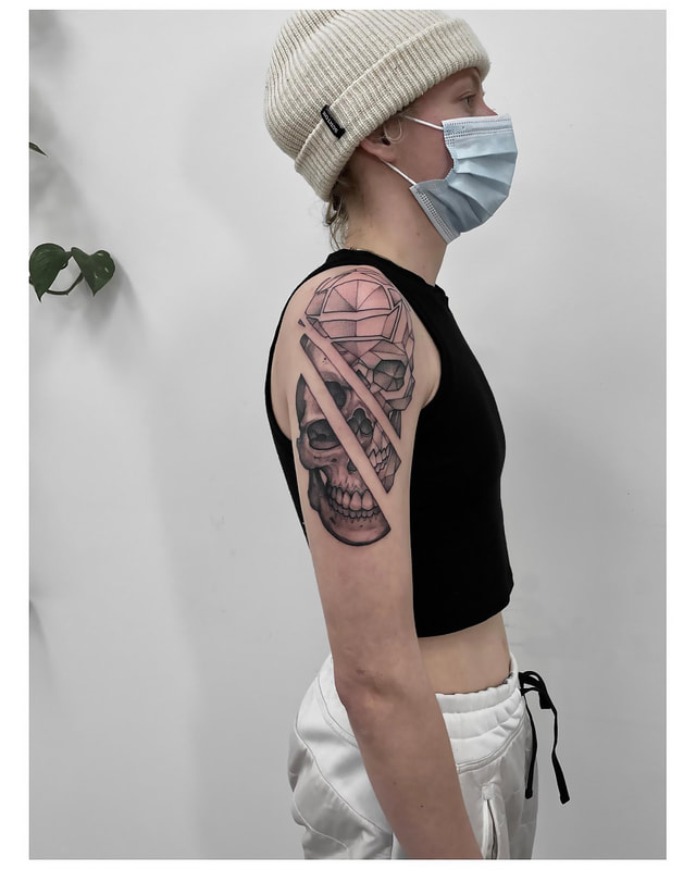 Geometric Skull Tattoo by tattoo artist Adam LoRusso Last Light Tattoo Studio Medford Massachusetts