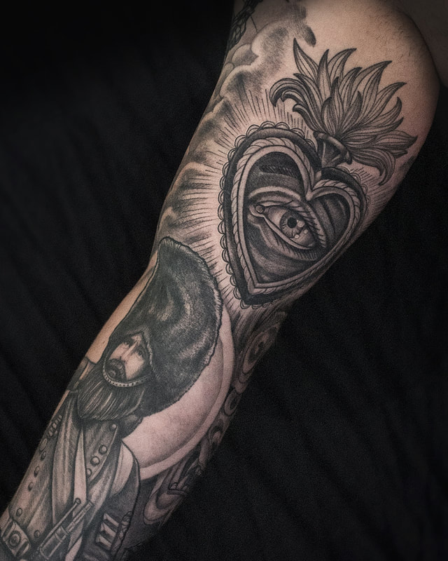Sacred heart Tattoo by Adam LoRusso artist black and grey boston sacred heart tattoo
