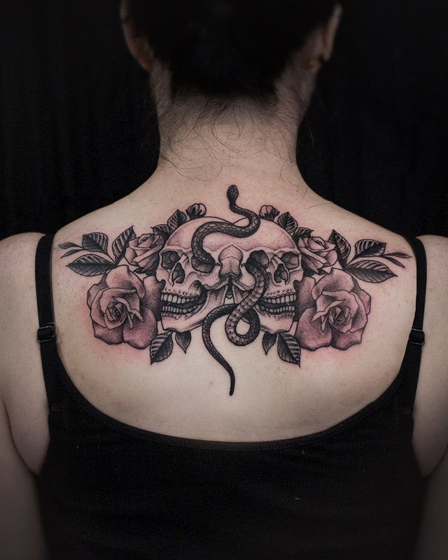 Skulls Back Tattoo by Adam LoRusso artist black and grey boston skull and roses backpiece