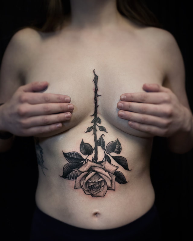 Sternum Rose Tattoo by tattoo artist Adam LoRusso Last Light Tattoo Studio Medford Massachusetts