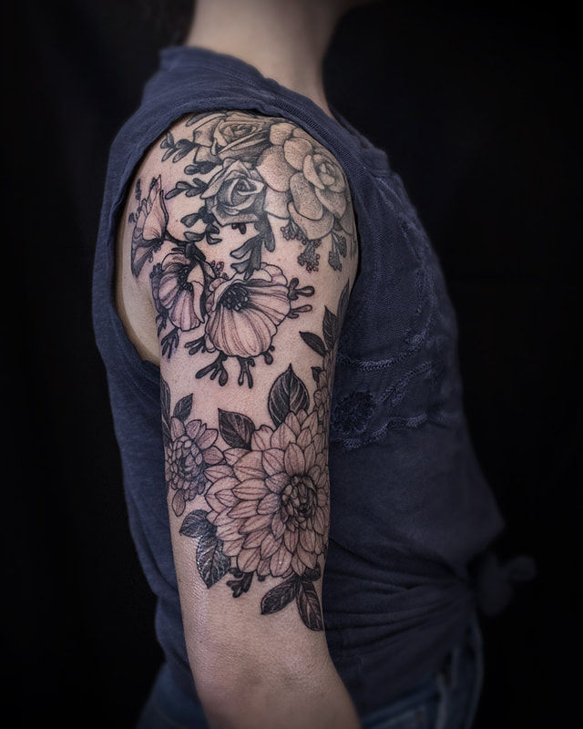 Floral Tattoo by Adam LoRusso artist black and grey boston floral half sleeve