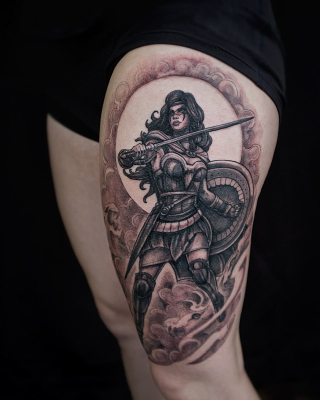 Tattoo by Adam LoRusso artist black and grey boston female warrior tattoo