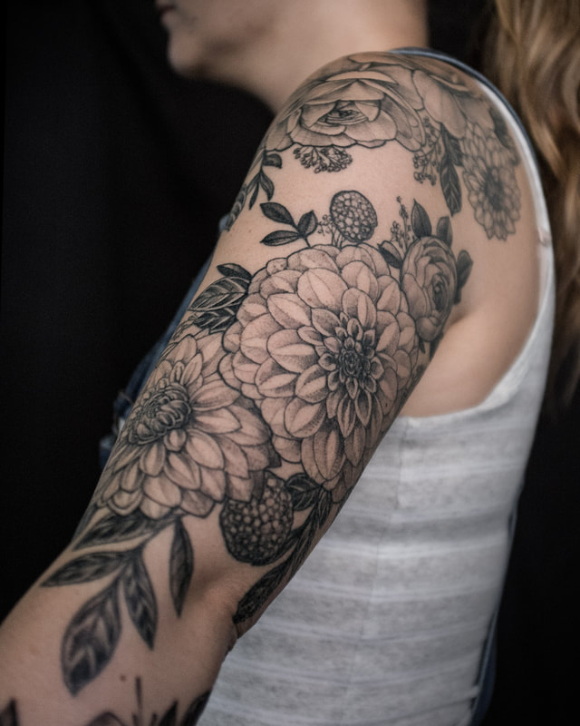 Tattoo by Adam LoRusso artist black and grey boston floral sleeve
