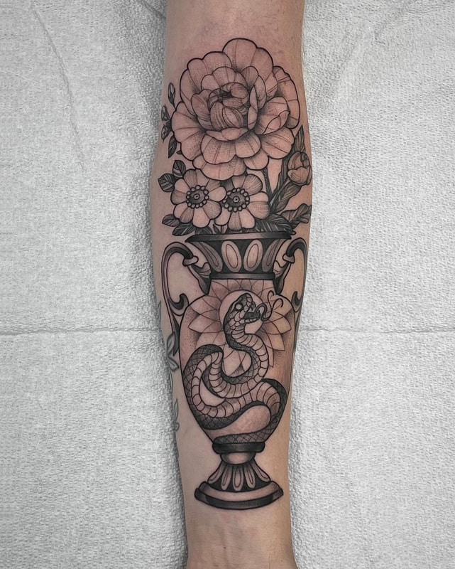 Floral Vase Tattoo by tattoo artist Adam LoRusso Last Light Tattoo Studio Medford Massachusetts