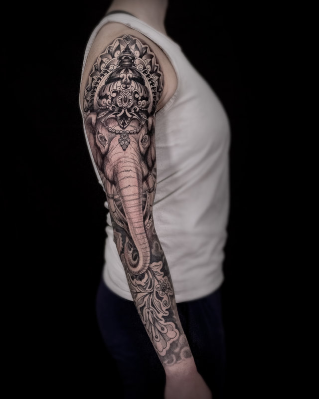 Ganesh Sleeve Tattoo by Adam LoRusso artist black and grey boston ganesh elephant